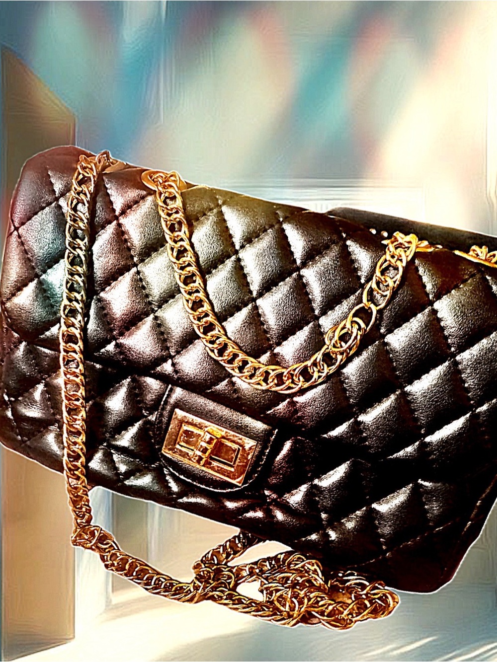 Elegant Quilted Black Leather and Gold Chain Bag